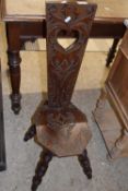 Late 19th Century mahogany high back weavers type chair with carved decoration