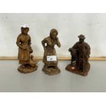 Group of three carved wooden continental figures