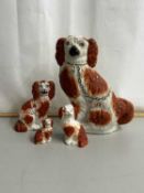 Group of four Staffordshire model Spaniels