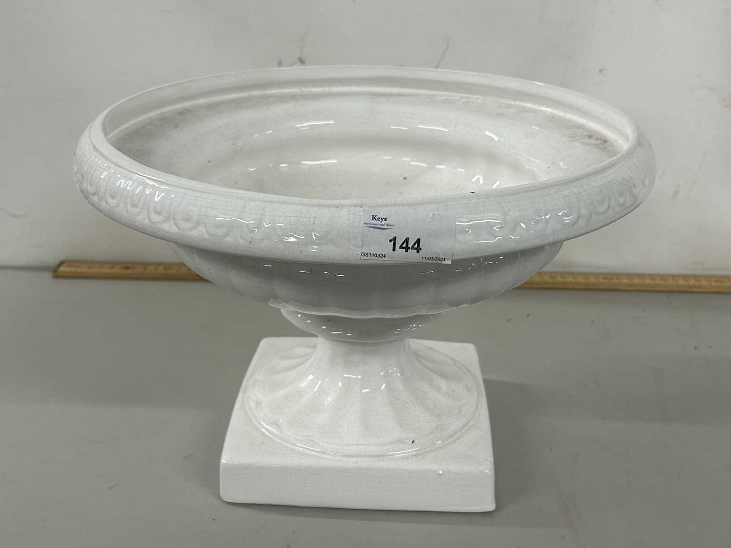 White glazed urn type jardiniere