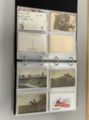 An album of postcards, fox hunting themes