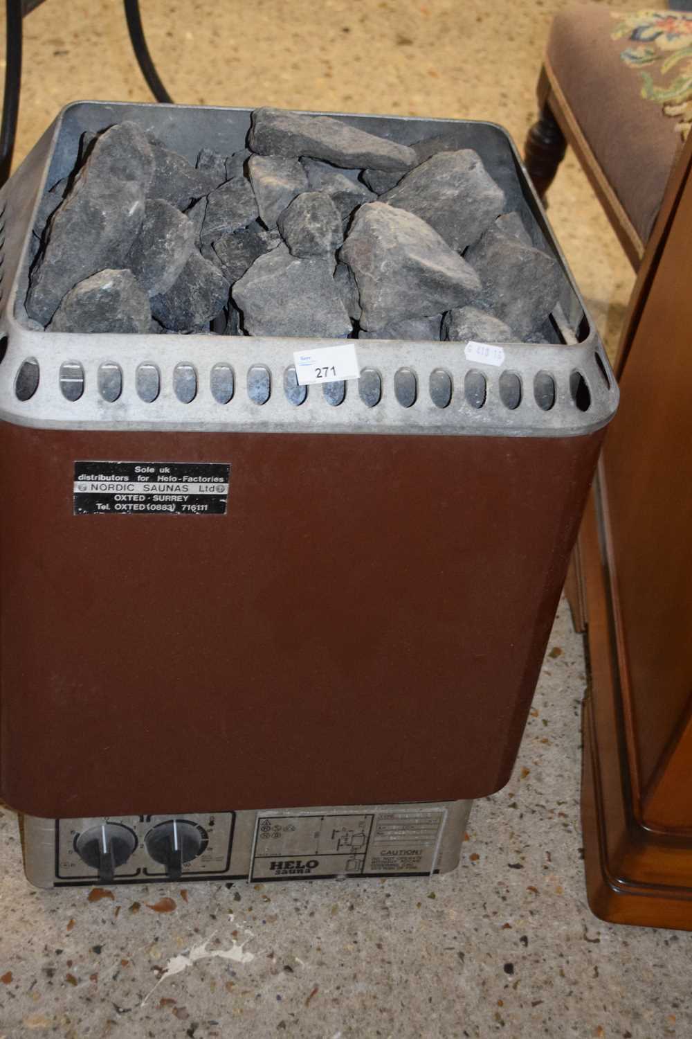 A Helo sauna electric heater with stones