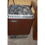 A Helo sauna electric heater with stones