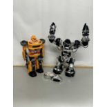 Two modern battery operated robot toys