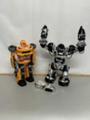 Two modern battery operated robot toys