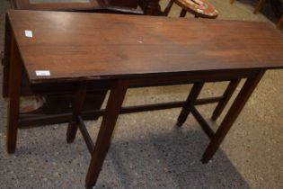 A mid Century single sided drop leaf dining table