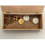 A group of Second World War medals comprising the 1938-1945 Star, the France and Germany Star,