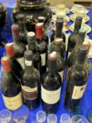 A group of sixteen bottles of various assorted red wine