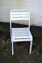 Pair of white metal cafe chairs