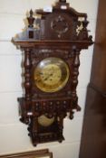 20th Century oak cased wall clock with brass movement striking on rods