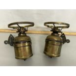 Two brass wall mounted oil lamps