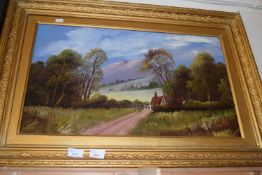 Cottage with mountains beyond oil on board in gilt frame