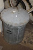 A galvanised dustbin