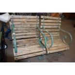 Pair of iron framed and slatted wood garden seats