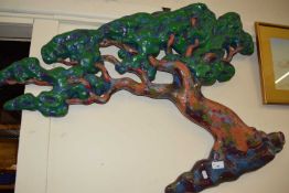 Glass fibre wall decoration formed as a tree