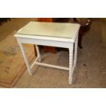 A cream painted side table