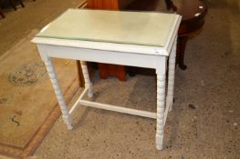 A cream painted side table