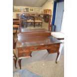 A Georgian revival mahogany dressing table with mirrored back