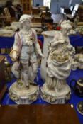 A pair of large continental porcelain figures, 65cm high, significantly damaged