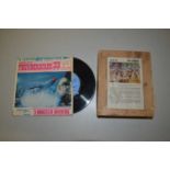 A vintage jigsaw The Combat together with Thunderbirds 33rpm mini album