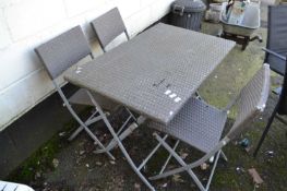 Modern garden table and three chairs