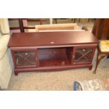 A mahogany effect television cabinet