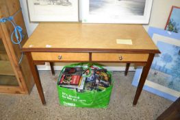 A 20th Century two drawer side table in the Art Deco style with birdseye maple veneered top and