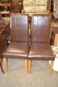 Pair of modern brown leather dining chairs