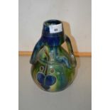 A Belgian Arts & Crafts type treacle glazed vase