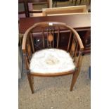 An Edwardian bow back mahogany framed chair