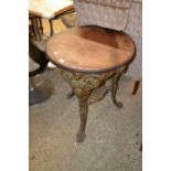 A cast base pub table with hardwood top, 60cm diameter