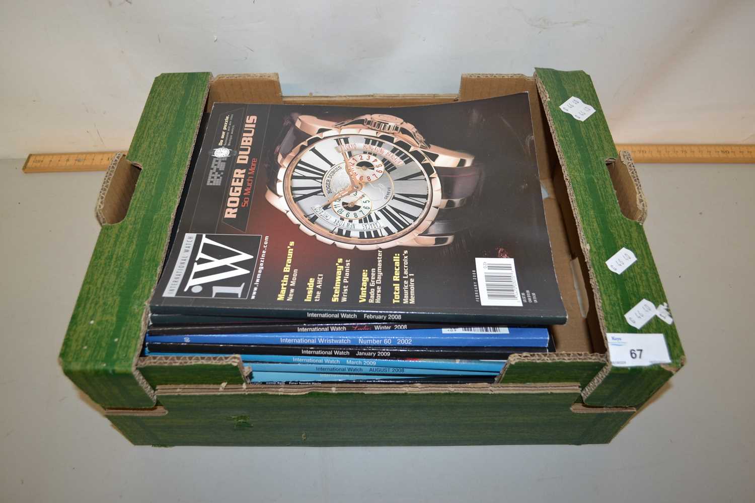 A box of International Watch magazines