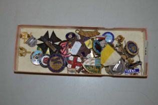 Box of various vintage pin badges