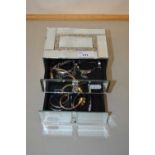 Small mirrored jewellery box containing assorted wristwatches