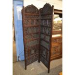 An Indian hardwood dressing screen formed as four sections, each section 194 x 60cm, the screen is