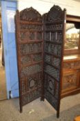 An Indian hardwood dressing screen formed as four sections, each section 194 x 60cm, the screen is