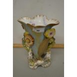 A 19th Century English porcelain vase decorated with flowers in relief, together with a 19th Century