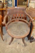 An early 20th Century oak framed desk chair