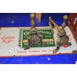 Churchmans Cigarettes tin plate sign and a pair of fire dogs