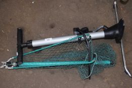 Hand pump and a fishing net