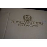 An album of Royal Wedding first day covers and Kings & Queens of England, two albums