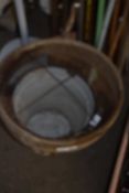 White enamel bucket and a garden sieve