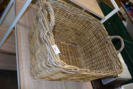 Two handled wicker laundry basket