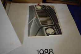 A Porsche calendar, Bentley and others