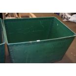 Plywood and green plastic vintage laundry bin on casters