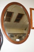 Mahogany framed oval wall mirror