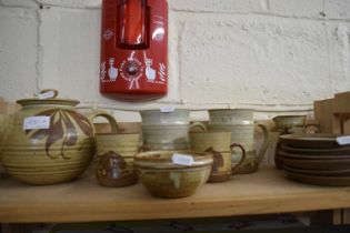 Quantity of stone ware cups, saucers and mugs