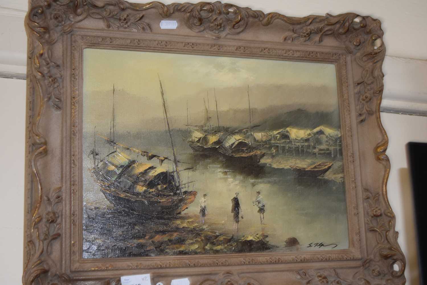 A pair of Far Eastern studies of harbour scenes with junk type boats, oil on canvas, gilt framed