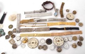 Mixed Lot: Various wrist and pocket watch dials and movements along with a selection of watch straps