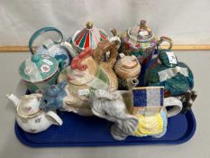 Tray of various novelty teapots